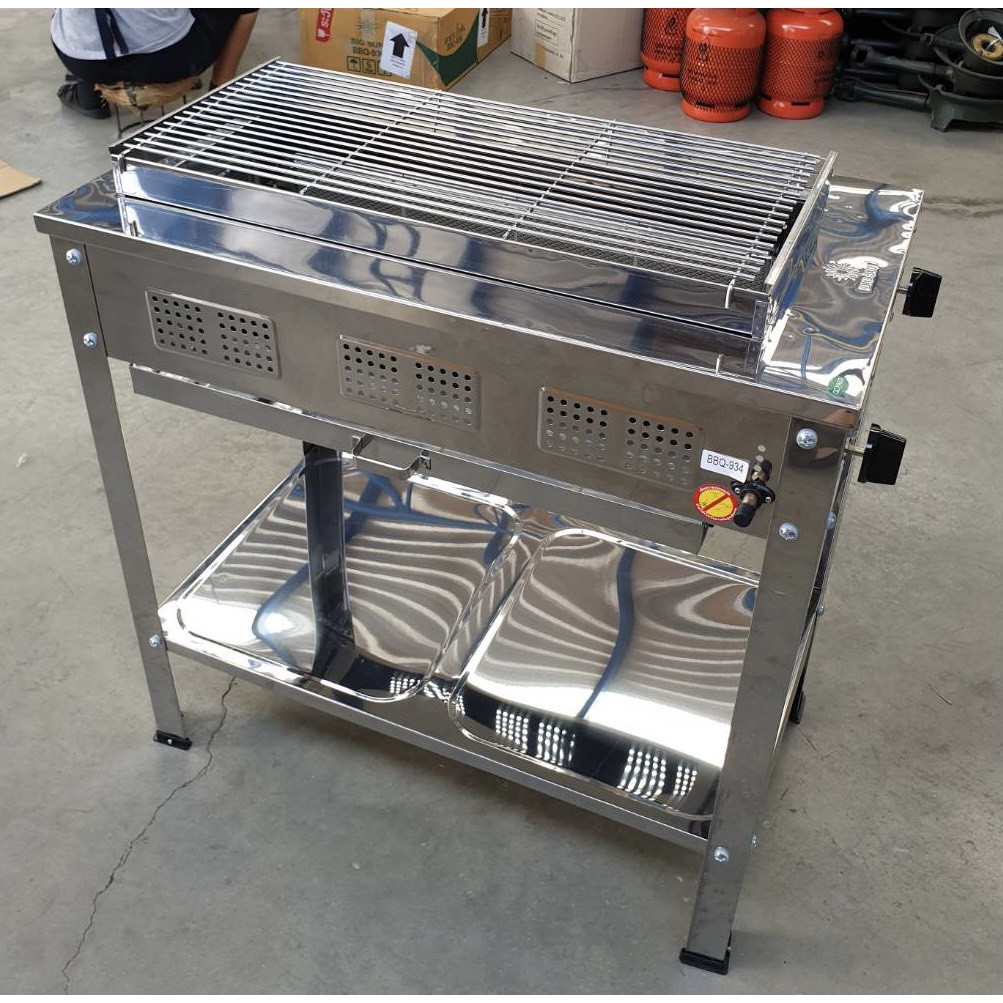 เมืองนนท์แก๊ส BIGSUN เตาย่างใช้แก๊สแบบมีขาตั้ง สแตนเลส รุ่น BBQ-934 ขนาดตะแกรง 63X30 ซม. แบบเดียวกับ BBQ-936 แต่มาใส่ขา