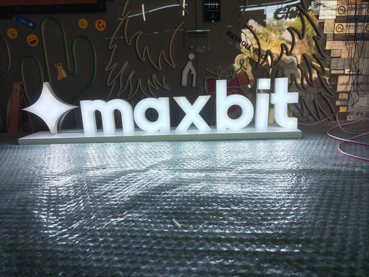 อักษรไฟออกหน้า '' MAXBIT ''