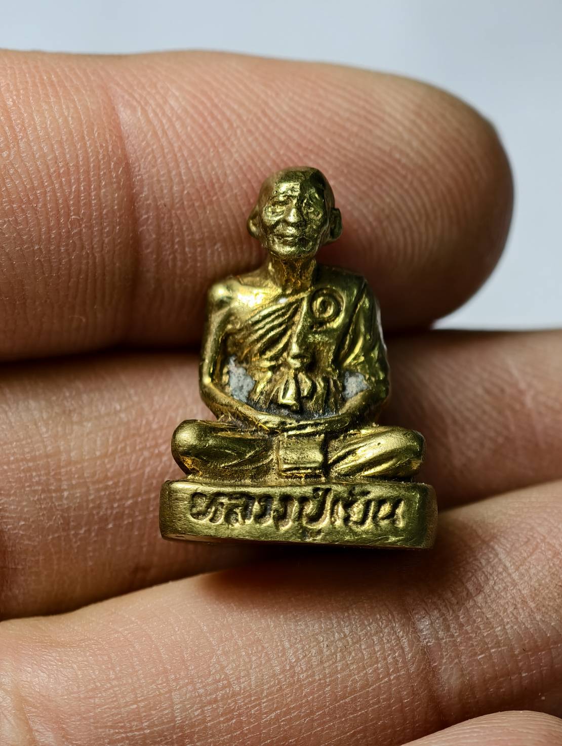 รูปหล่ออุดกริ่ง หลวงปู่เย็น วัดสระเปรียญ อ.สรรคบุรี จ.ชัยนาท (SKU-13556)