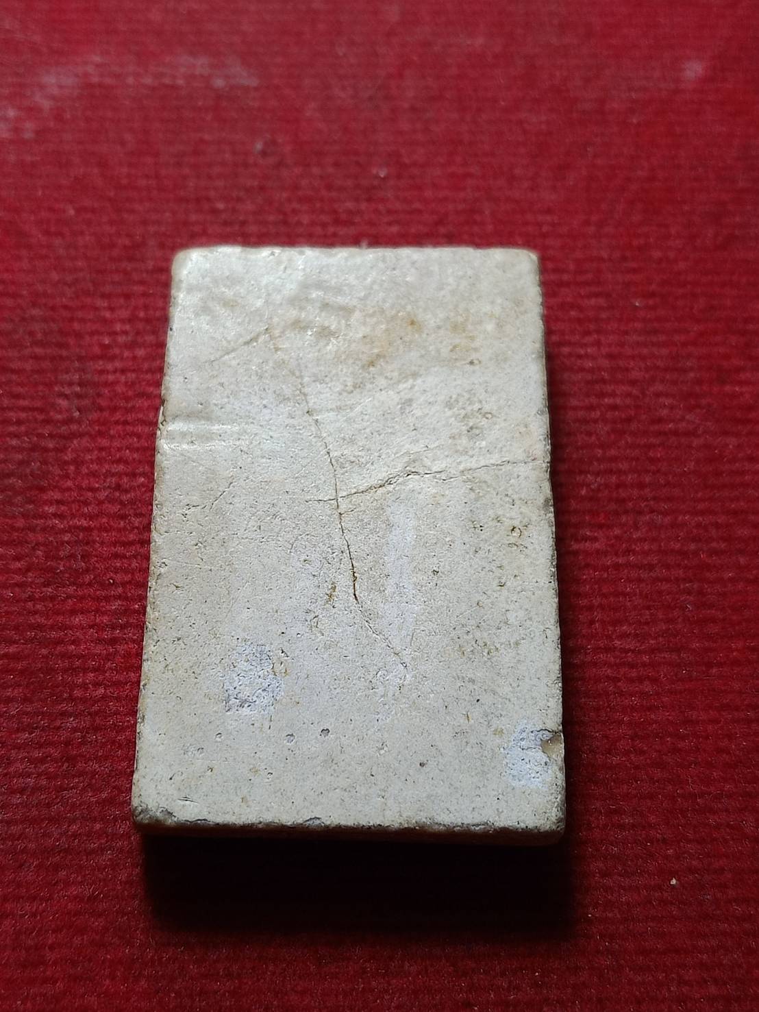 พระผงรูปเหมือน บรรจุกริ่ง หลวงพ่อขาว วัดชันสูตร จ. สิงห์บุรี ปี 2516 (SKU-11698)