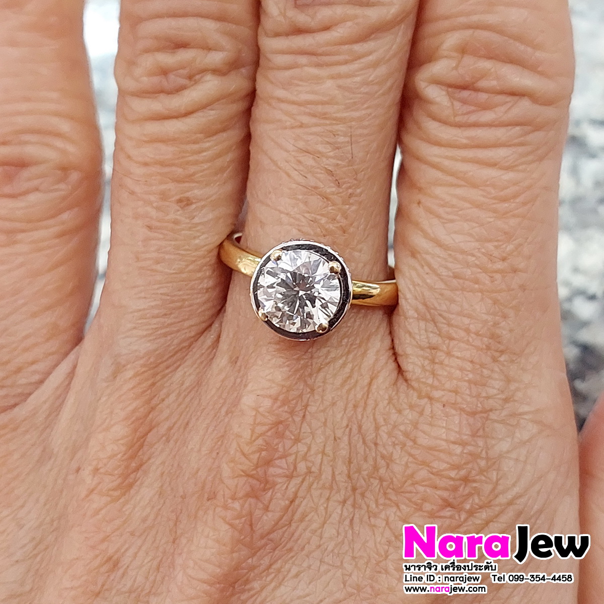 แหวนเพชร เม็ดชู นน. 1.5 กะรัต ล้อมเพชร 0.36 กะรัต น้ำ 92 vs