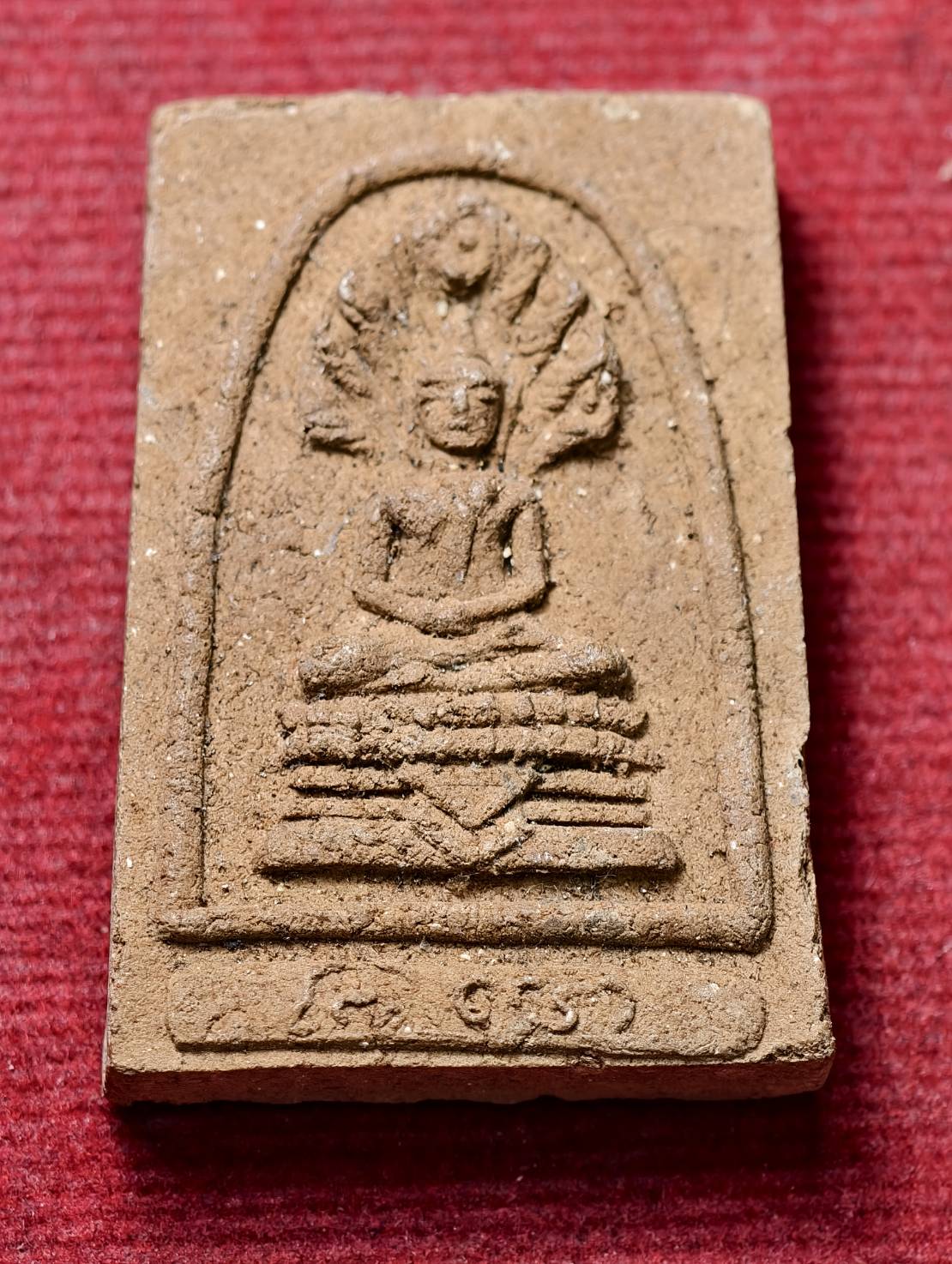 พระผงพระนาคปรก หลวงปู่ดีเนาะ วัดมัชฌิมาวาส จ.อุดรธานี (SKU-13740)