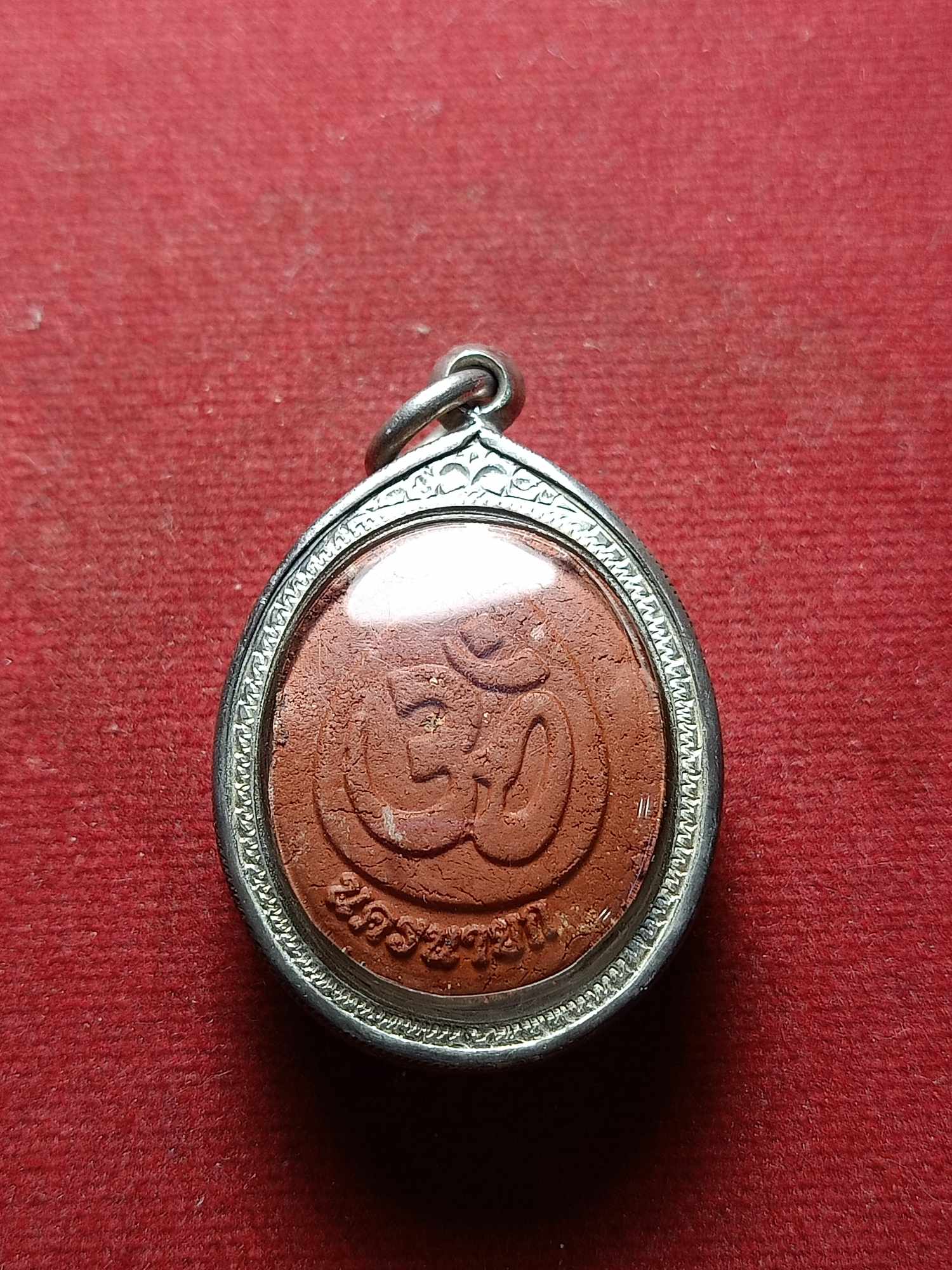 พระพิฆเนศเนื้อผง เลี่ยมเงิน จ.นครนายก (SKU-04712)