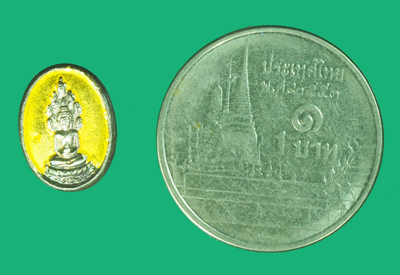 *38837 เหรียญเม็ดแตงลงยา หลวงปู่เหรียญ วัดอรัญบรรพต หนองคาย เนื้่อเงิน 87