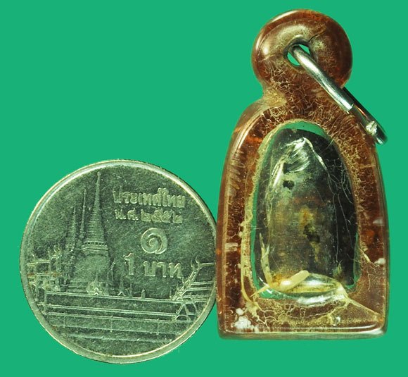 ขายแล้ว *37862 ตะกรุดหัวลูกปืน หลวงพ่อกวย วัดโฆษิตราราม ชัยนาท เลี่ยมพลาสติกเก่าแตกลายงาถึงยุค 12